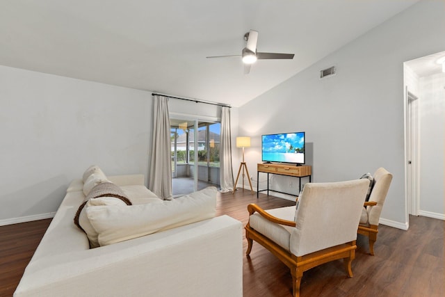 living room featuring lofted ceiling, dark wood-type flooring, and ceiling fan