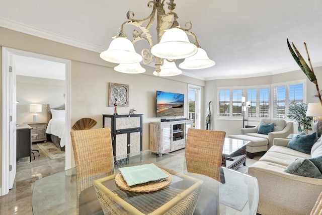 living room featuring crown molding and a notable chandelier