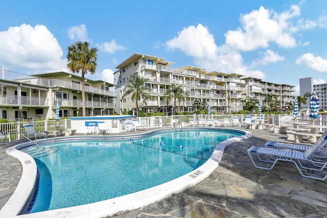 view of pool featuring a patio