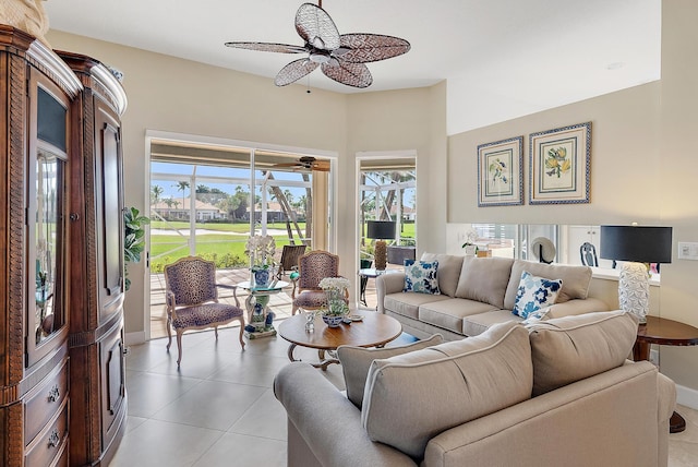 tiled living room with ceiling fan