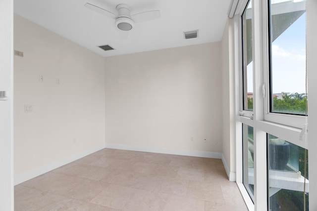 empty room featuring ceiling fan