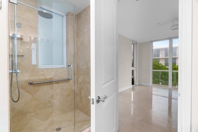 bathroom with a shower with shower door