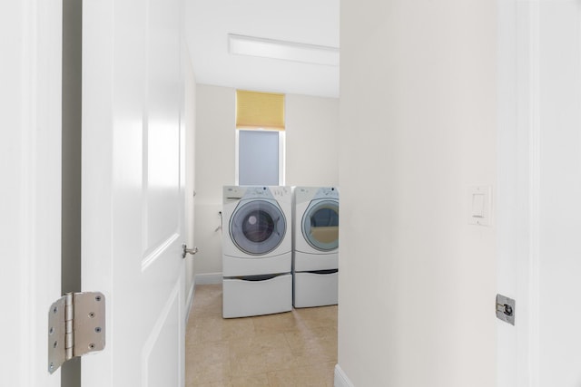 laundry room featuring washer and dryer