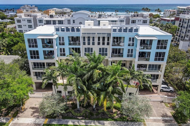 view of building exterior featuring a water view