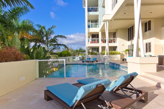 view of pool with a patio area