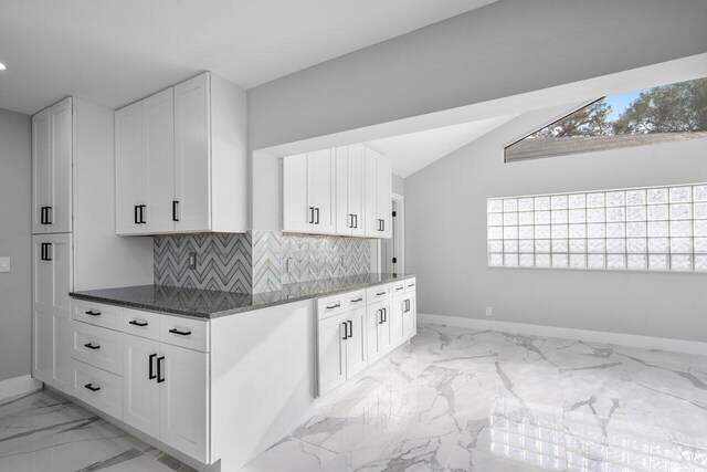 laundry area featuring cabinets, sink, and washing machine and clothes dryer