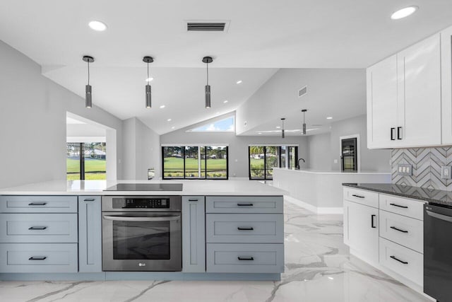 kitchen with hanging light fixtures, gray cabinetry, white cabinets, and black appliances