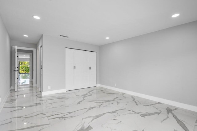 unfurnished bedroom featuring recessed lighting, baseboards, and visible vents