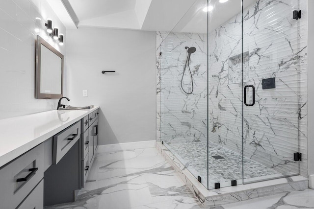 bathroom with walk in shower and vanity