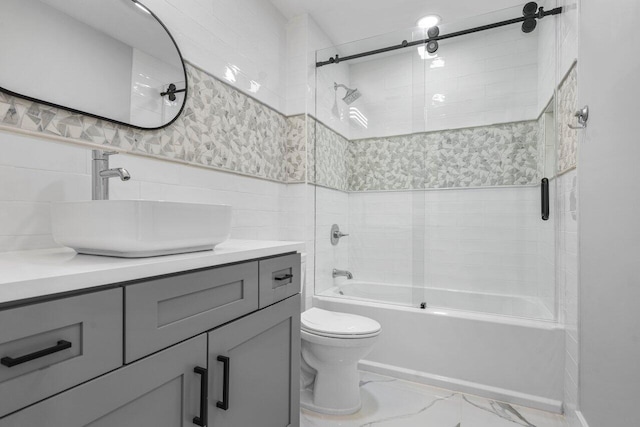 51 Woods Ln, Boynton Beach, FL 33436 - full bath featuring shower / washtub combination, toilet, vanity, tile walls, and marble finish floors