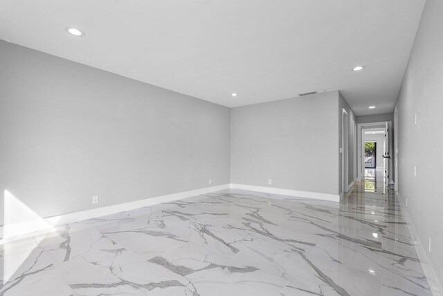 51 Woods Ln, Boynton Beach, FL 33436 - unfurnished room with recessed lighting, baseboards, and marble finish flooring