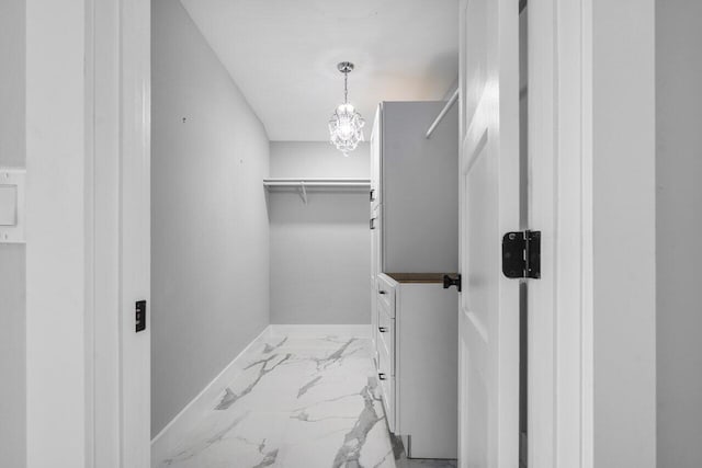 51 Woods Ln, Boynton Beach, FL 33436 - walk in closet with marble look tile flooring