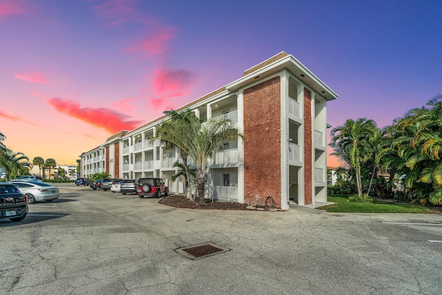 236 Castlewood Dr Unit 208, North Palm Beach, FL 33408 - view of property with uncovered parking