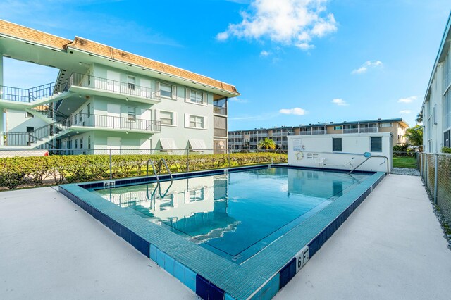 view of yard with a patio and a water view