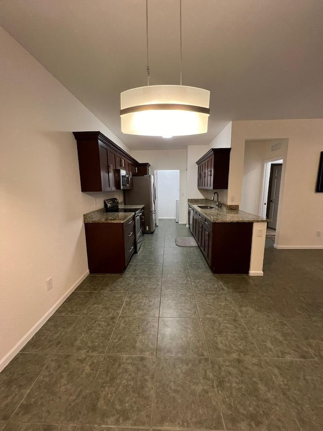 kitchen with dark brown cabinets, hanging light fixtures, sink, light stone countertops, and stainless steel appliances