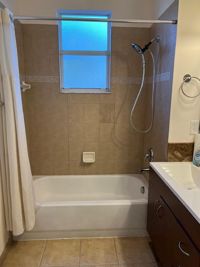 bathroom featuring tile patterned floors, vanity, and shower / bath combination with curtain