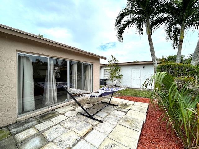 view of patio with central AC