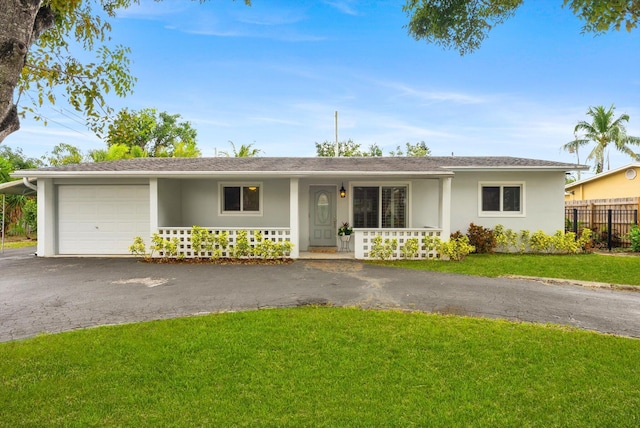 single story home with a garage and a front yard