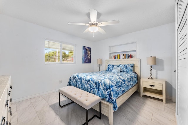 bedroom featuring ceiling fan