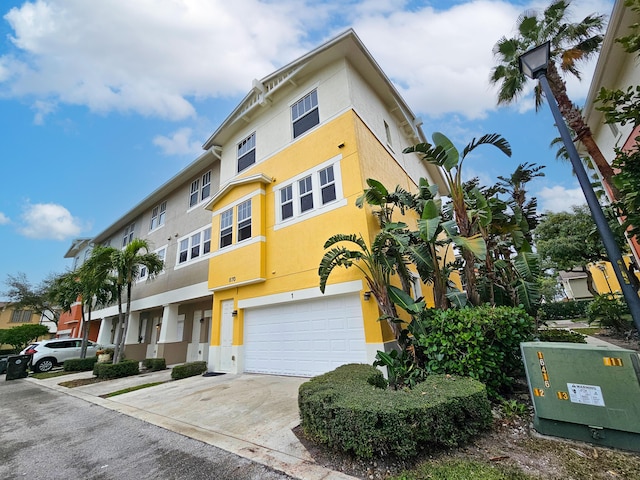 view of front of property featuring a garage