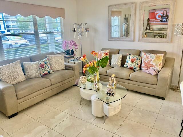 living room with light tile patterned floors