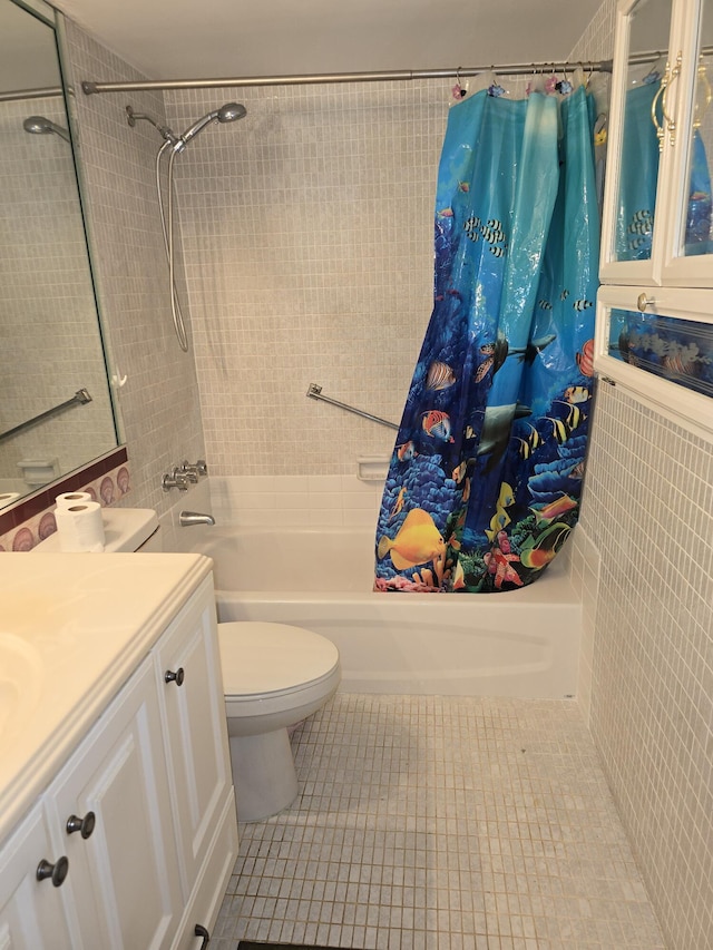 full bathroom featuring toilet, shower / bath combination with curtain, tile patterned floors, and vanity