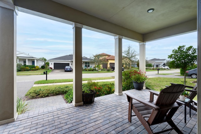 view of patio featuring a porch