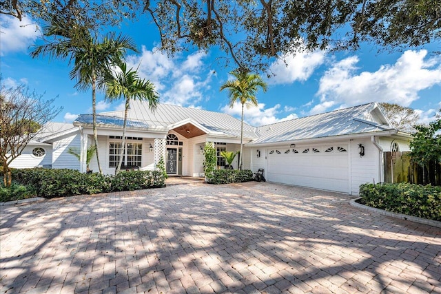 ranch-style house featuring a garage