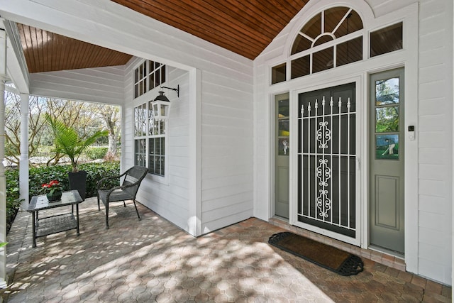 entrance to property with covered porch