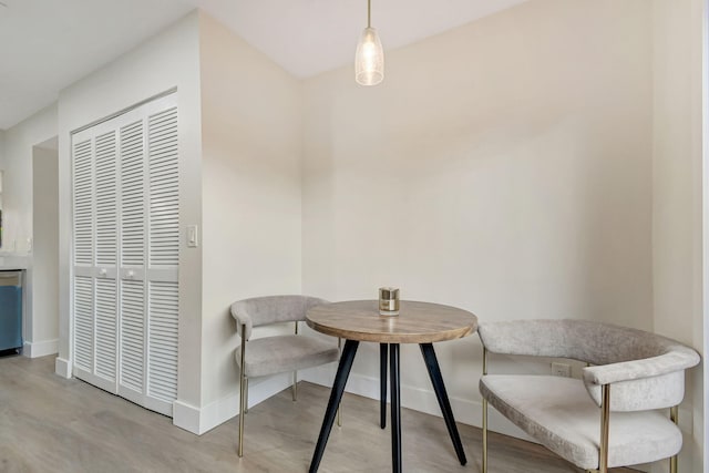 sitting room featuring light hardwood / wood-style floors