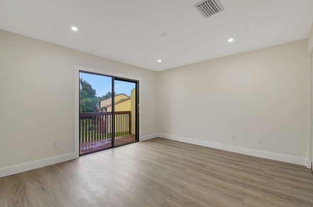 empty room featuring light hardwood / wood-style floors