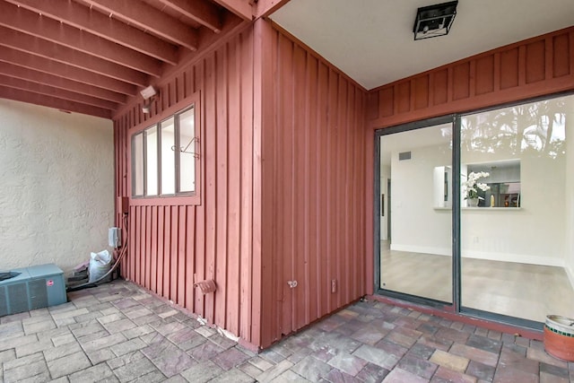 interior space featuring central AC unit and a patio area