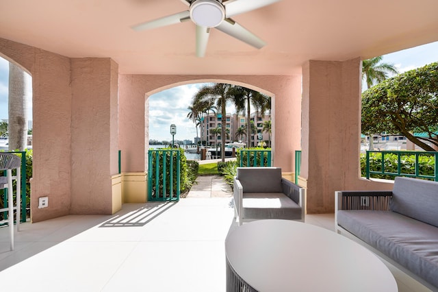 view of patio featuring ceiling fan and an outdoor living space