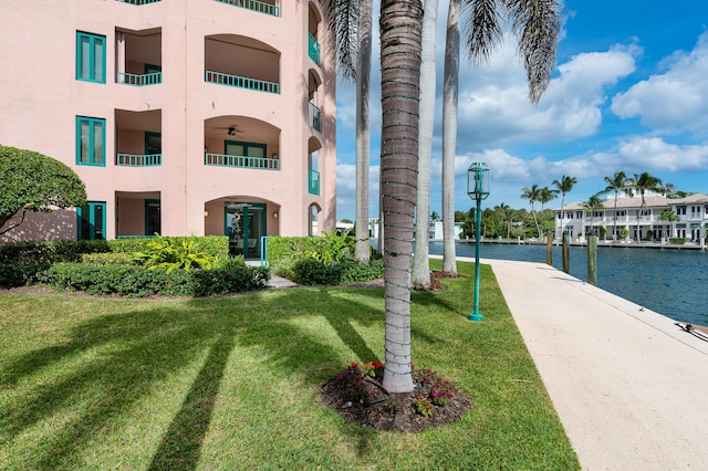 view of building exterior with a water view