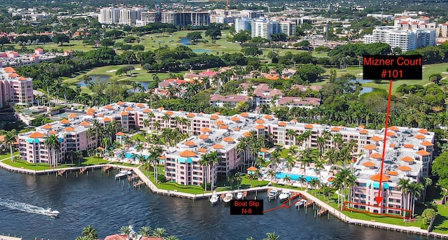 birds eye view of property with a water view