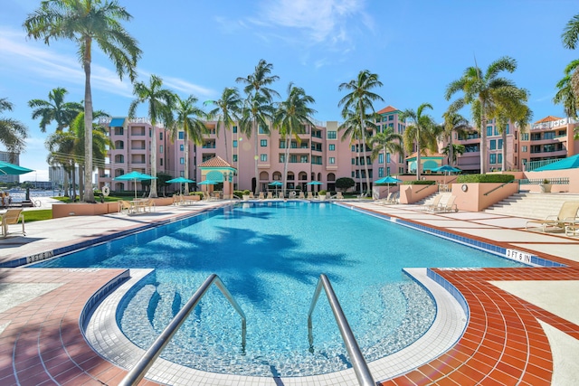 view of swimming pool featuring a patio area