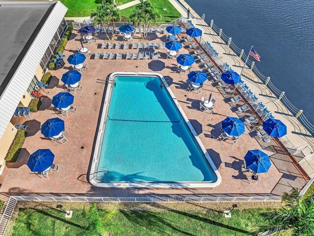 view of swimming pool with a patio area