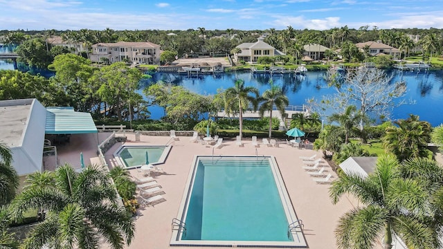 drone / aerial view featuring a water view