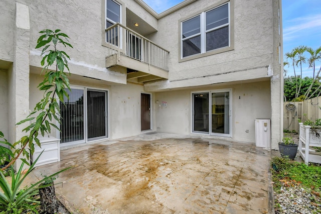 back of property featuring a patio area