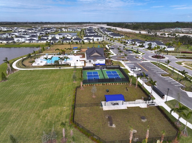 aerial view featuring a water view and a residential view