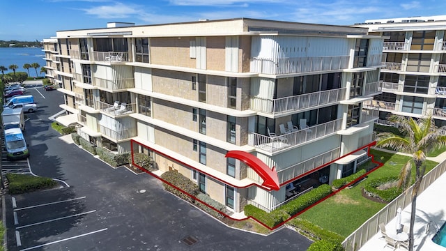 view of building exterior with a water view