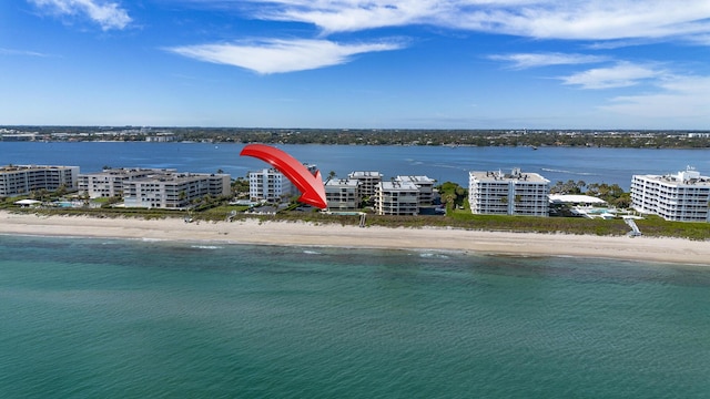 aerial view featuring a beach view and a water view