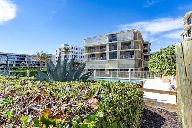 view of property with a community pool