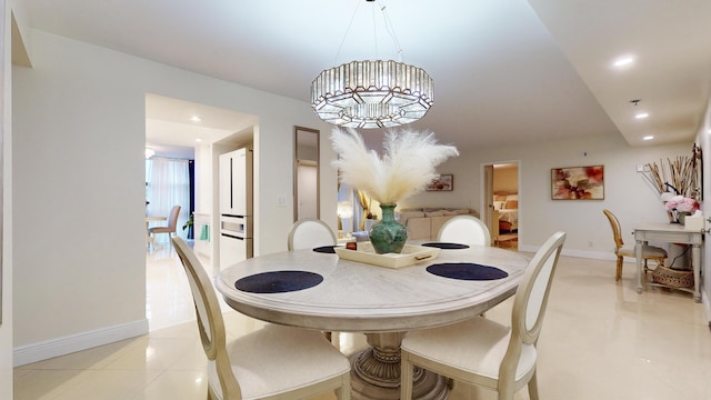 dining area with light tile patterned floors