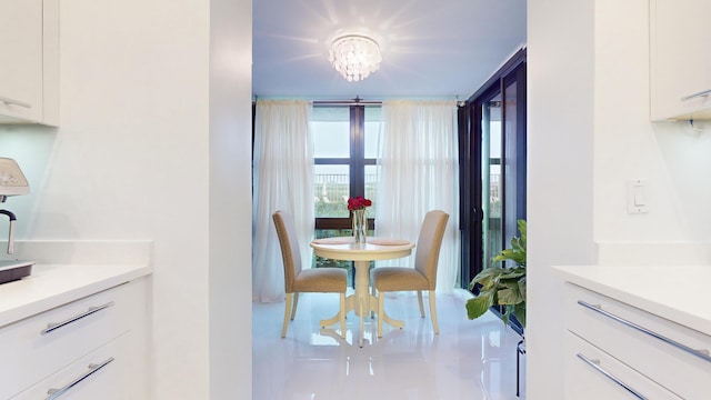 dining area featuring an inviting chandelier