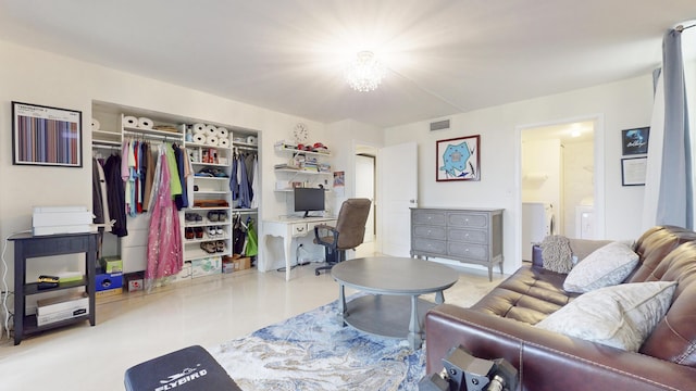 living room featuring independent washer and dryer