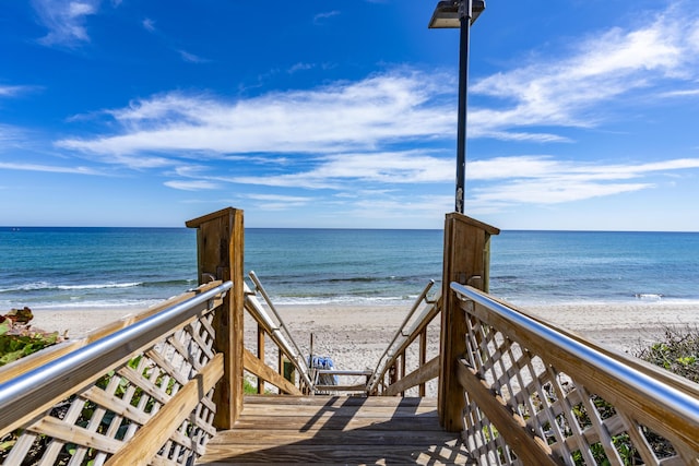 view of home's community with a view of the beach and a water view