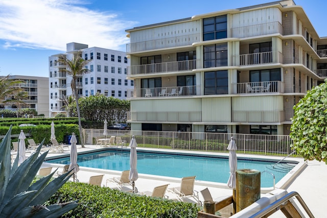 view of swimming pool with a patio