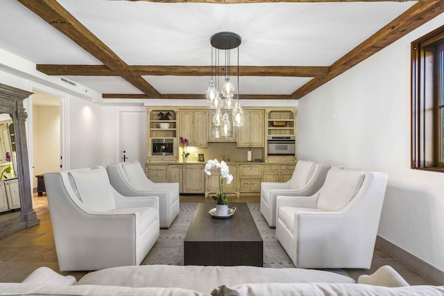 living room featuring coffered ceiling and beamed ceiling