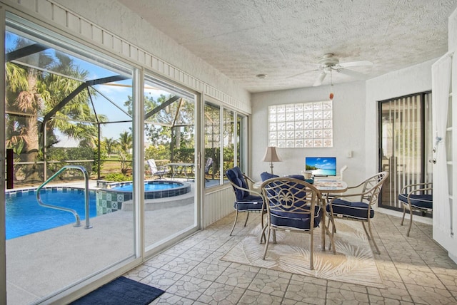 sunroom / solarium with ceiling fan